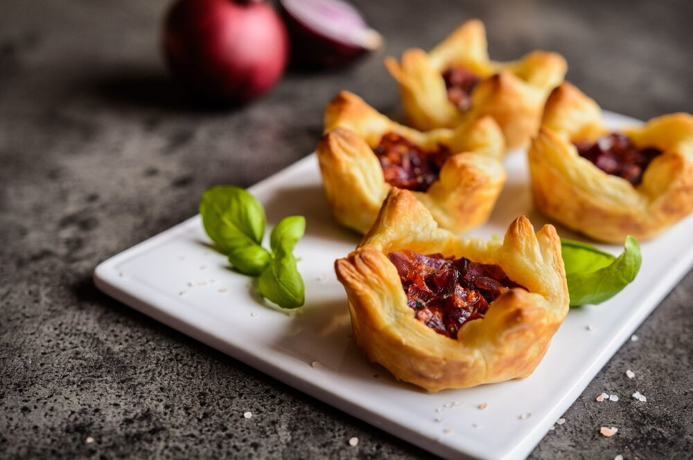 Cheddar and red onion tartlets