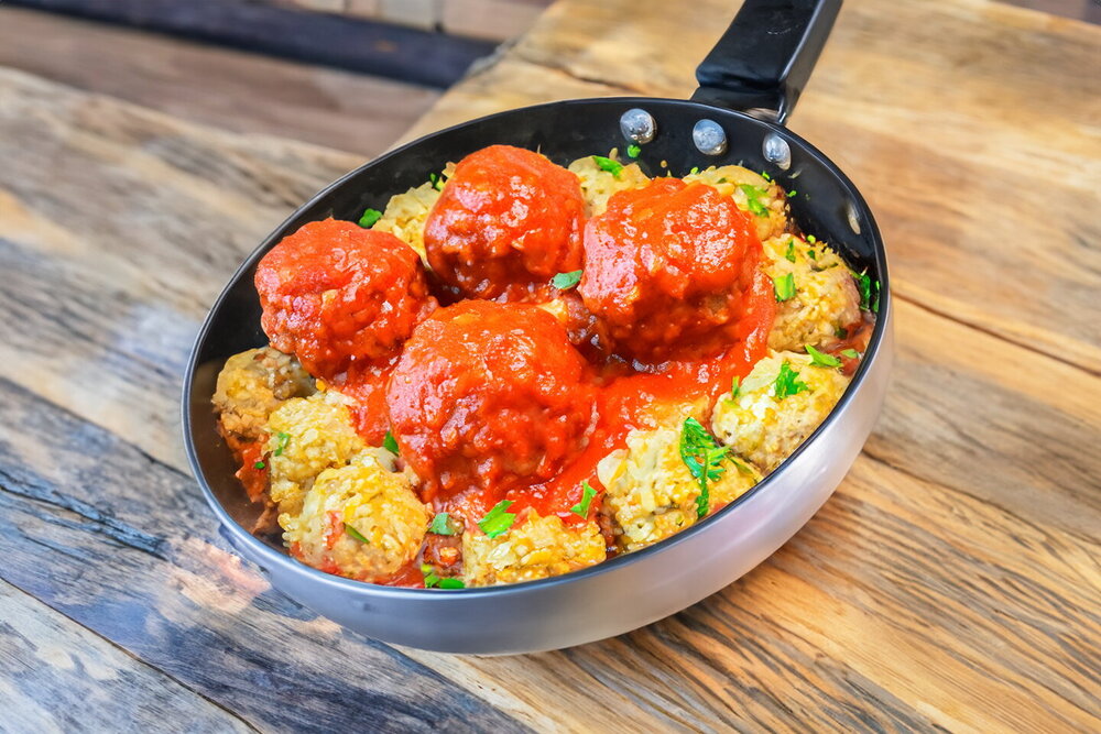 Meatballs with Rice in Tomato Sauce in a Skillet
